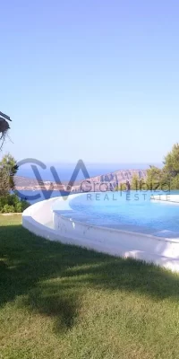 Exquisite Luxury Estate with Three Villas and Direct Sea Access in Cala Boix, San Carlos