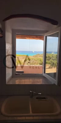 Villa en primera línea con bonitas vistas al mar en Es Caló